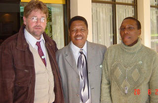 From left to right: Dr Andre van Rooyen, regional coordinator for DMP-SEA; Mr NM Duma, Minister of Agriculture in the North West Province, Ms M Rosho  Director of Corporate Communications in the Department of  Agriculture, NW Province.