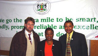 Photo below, from left to right: Dr. van Rooyen; Dr. M. E. Mogajane, Deputy Director General for Agriculture in NW Province; Mr. Thabang Tseladimitloa, LandCare Coordinator in the North West Province.